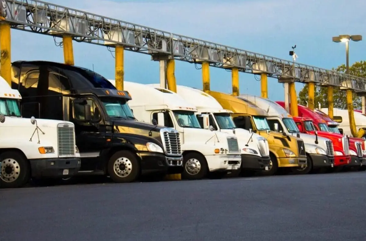 Row of semi trucks at a truck stop
